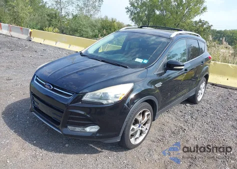 2016 Ford Escape Titanium z USA, uszkodzony, nr VIN 1FMCU9J90GUC16559